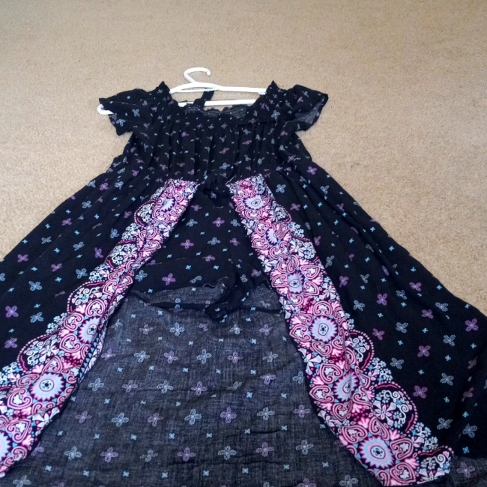 Romper. There are shorts underneath the over skirt